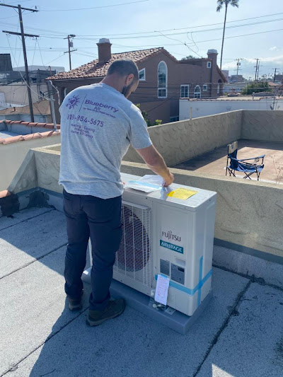 Inspecting and cleaning the condenser coil
